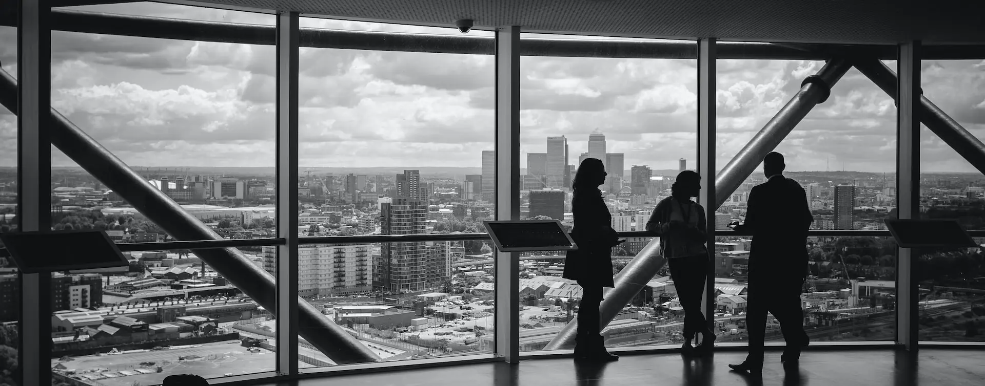 people standing inside city building