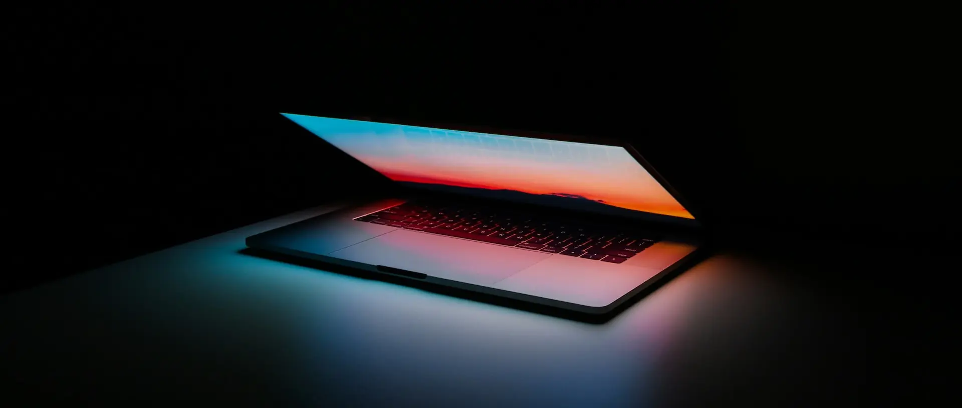 a laptop with a red light